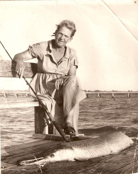 Granny Blaker with a large gar she caught at her and PawPaw's house on Carancahua Bay
